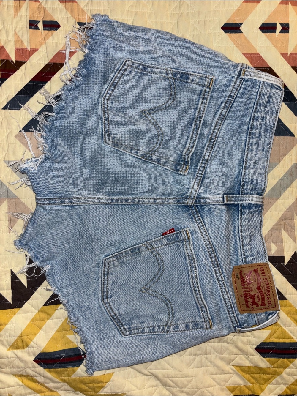 Levi's Light Blue Frayed Denim Cutoff Shorts